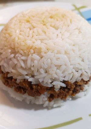 Una foto de Arroz tapado