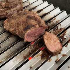 Una foto de Colita de cuadril y vacío a la parrilla