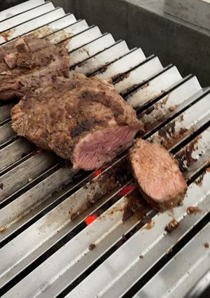 Una foto de Colita de cuadril y vacío a la parrilla