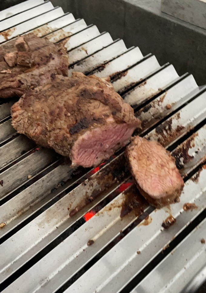 Una foto de Colita de cuadril y vacío a la parrilla