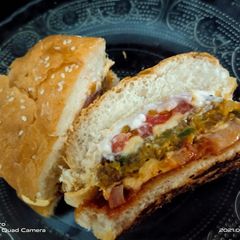A picture of Sabudana tikki double cheeseburger.
