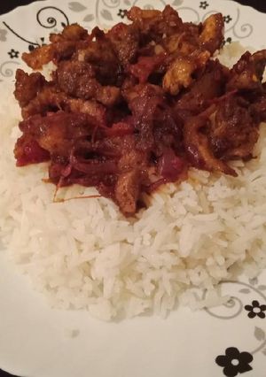 A picture of Fried Pork with Rice.