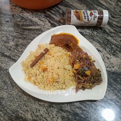 A picture of Savoury rice with grilled fish sauce and Avocado salad.