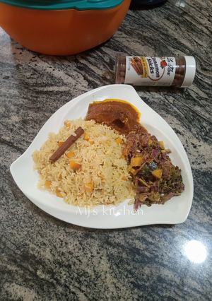 A picture of Savoury rice with grilled fish sauce and Avocado salad.