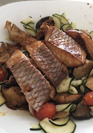 A picture of Grilled fish with zucchini Salad.