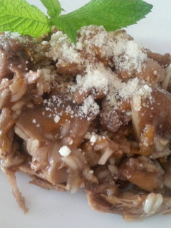 Una foto de Risotto de conejo y setas