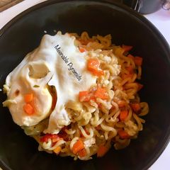 A picture of Vegetable Indomie with poached egg#kano.