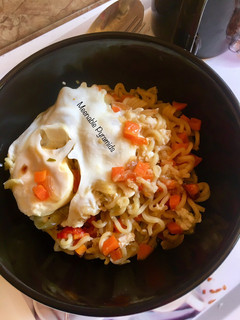 A picture of Vegetable Indomie with poached egg#kano.