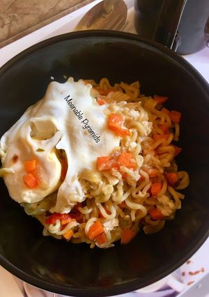 A picture of Vegetable Indomie with poached egg#kano.
