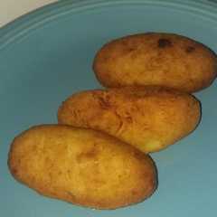 Una foto de Bombas de papa rellenas de queso