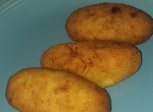 Una foto de Bombas de papa rellenas de queso