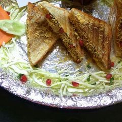 A picture of Grilled Dabeli sandwich.