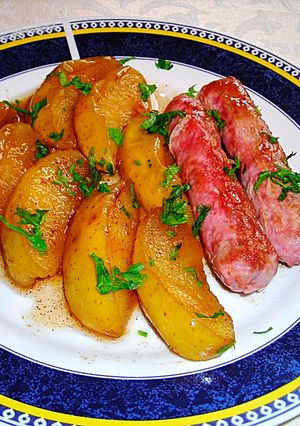 Foto principal de Salchichas frescas con manzanas caramelizadas fácil