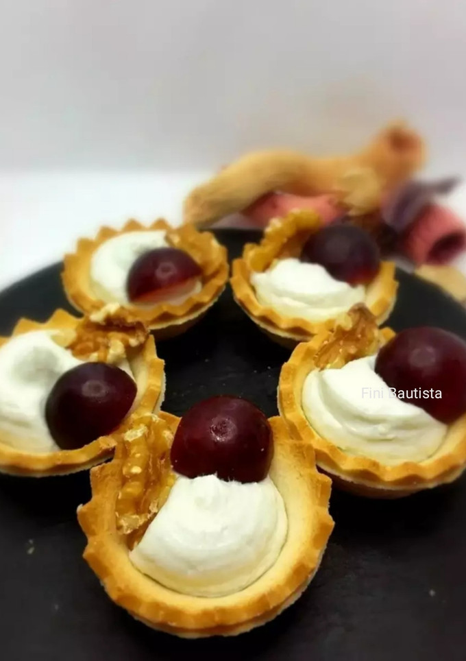 Una foto de Canapés tartaletas de crema de queso azul
