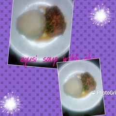 Egusi soup and eba A picture of Egusi soup and eba.