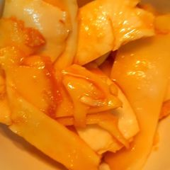 A picture of Tender coconut marinated with jaggery syrup.