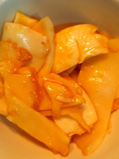 A picture of Tender coconut marinated with jaggery syrup.
