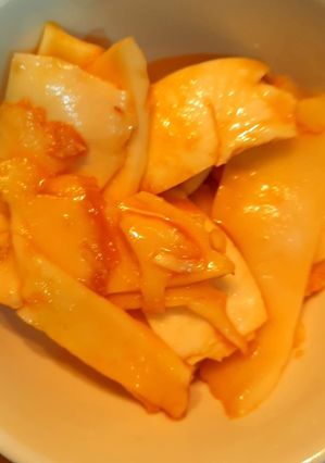 A picture of Tender coconut marinated with jaggery syrup.