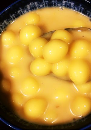 A picture of Paal Kozhukattai (Rice dumplings in sweetened coconut milk).