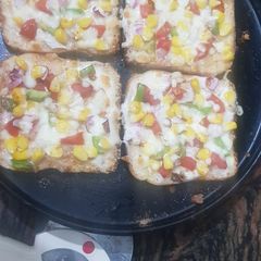 A picture of Bread pizza-simple recipe for pizza lovers in lockdown.