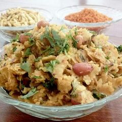 A picture of Khaate meethe Chapati  pohe.