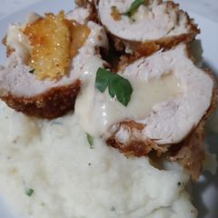 A picture of Chicharrones Coated Chicken Stuffed with Cheese.