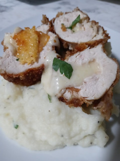 A picture of Chicharrones Coated Chicken Stuffed with Cheese.