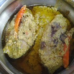 A picture of Dahi Hilsa fish steamed.
