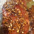 Bondiola de cerdo en salsa de naranja y comino