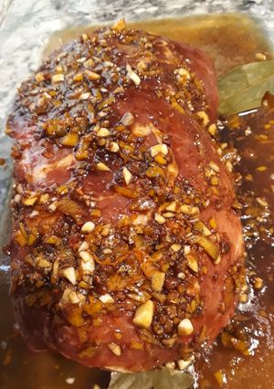 Una foto de Bondiola de cerdo en salsa de naranja y comino