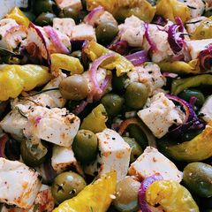 A picture of Baked feta cheese with olives 🤤.
