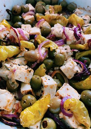 A picture of Baked feta cheese with olives 🤤.