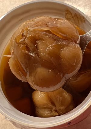 A picture of Pickled Garlic 🧄.