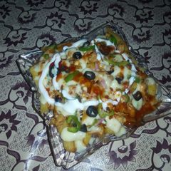 A picture of Restaurant style pizza fries.