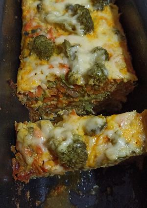 Una foto de Budín de verduras zanahorias, Zucchini y Brócolis🥕🥦🥒