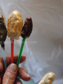 A picture of Chocolate covered date pops.