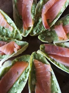 A picture of Endive Boats with Avocado, Creamy Cheese, and Smoked Salmon.