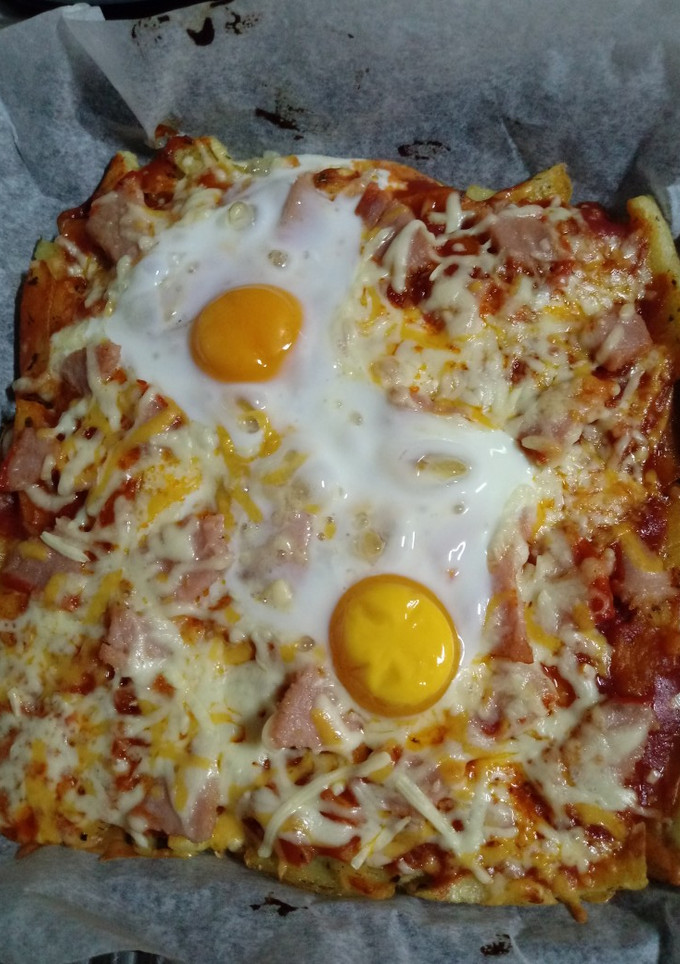 Una foto de Pizza 🍕 con base de patatas fritas 🍟