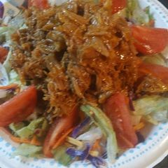 A picture of Salad with Buffalo Pulled Pork.