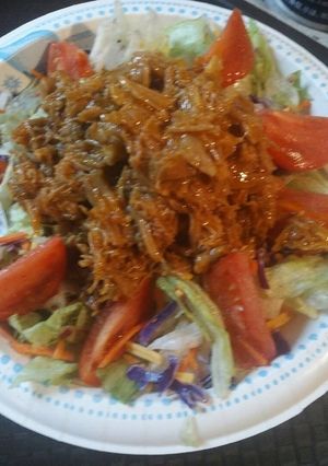 A picture of Salad with Buffalo Pulled Pork.