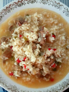 Una foto de Arroz caldoso con mollejas de pollo