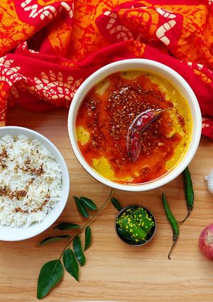 A picture of Panchratna Dal tadka with jeera rice.