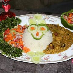 A picture of Chicken achari with mix dal & boiled rice + kachumar salad 🥗.