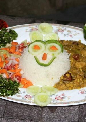 A picture of Chicken achari with mix dal & boiled rice + kachumar salad 🥗.