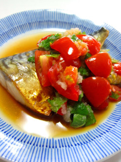 A picture of Grilled Mackerel with Tomato, Shiso, Grated Daikon Radish, and Ponzu Sauce.