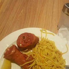 A picture of Turkey meat and spaghetti.