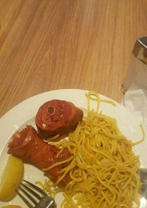 A picture of Turkey meat and spaghetti.