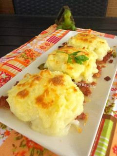 Una foto de Huevos gratinados con puré de patata