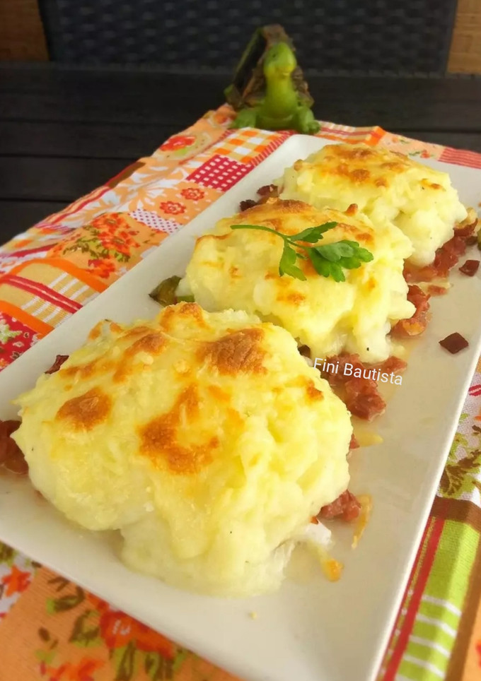 Una foto de Huevos gratinados con puré de patata