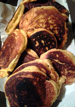 A picture of fried cornbread with opitional jalapeños.